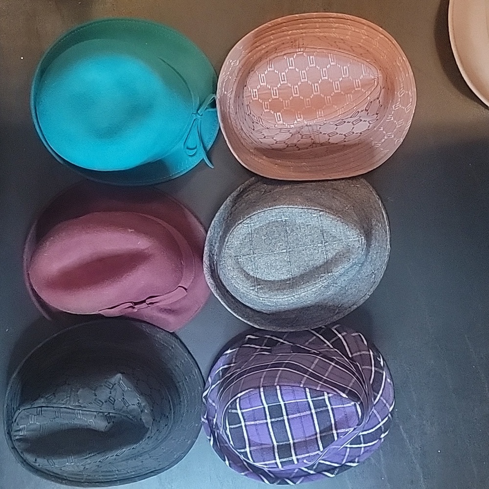 Seven Hats one with tag, some new and never worn, or just once. MULTIPLE color